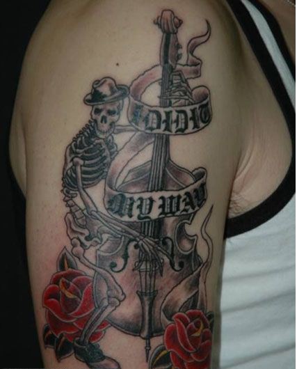 个性手臂时尚骷髅骨架吉他花纹身图片