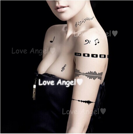 性感女生全身唯美音乐符纹身图