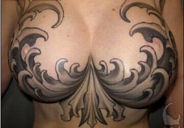 胸部全裸大胸美女个性胸部波浪纹身图