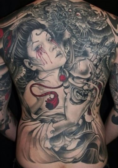 渲染着恐怖的满背纹身图案大全图片