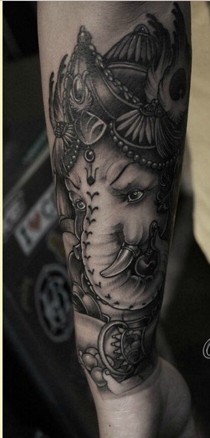 个性时尚手臂象神纹身图案图片