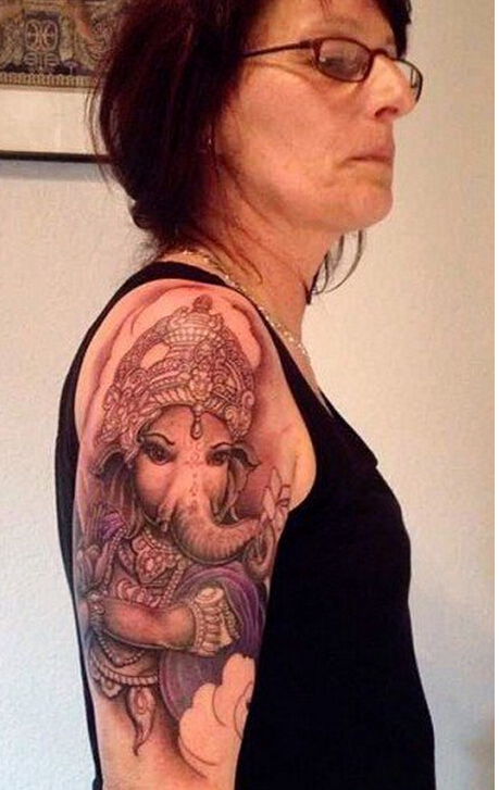 国外美女手臂时尚好看的彩色宗教象神图片