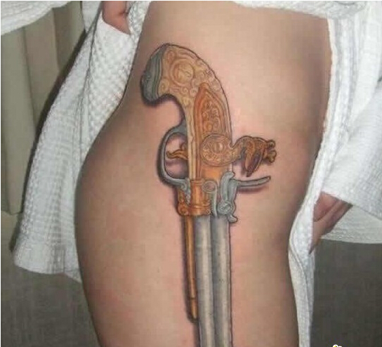 美女大腿个性时尚好看的手枪纹身图案