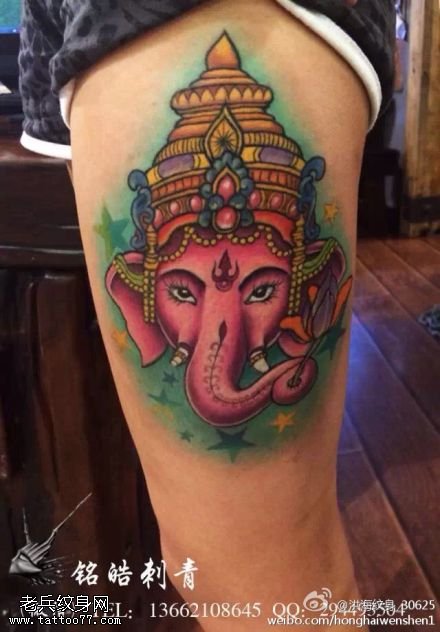 腿部彩色象神纹身图片