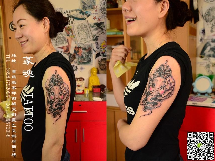 手臂上好看的象神纹身