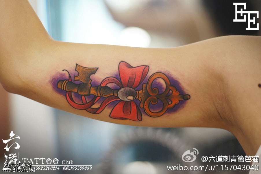 胳膊原创水彩心上钥匙纹身图案