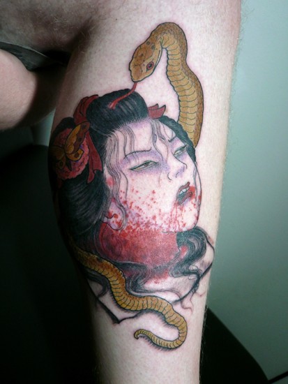 针三味腿部纹身作品