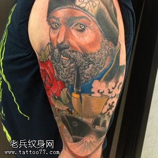 胳膊上的照片纹身图案