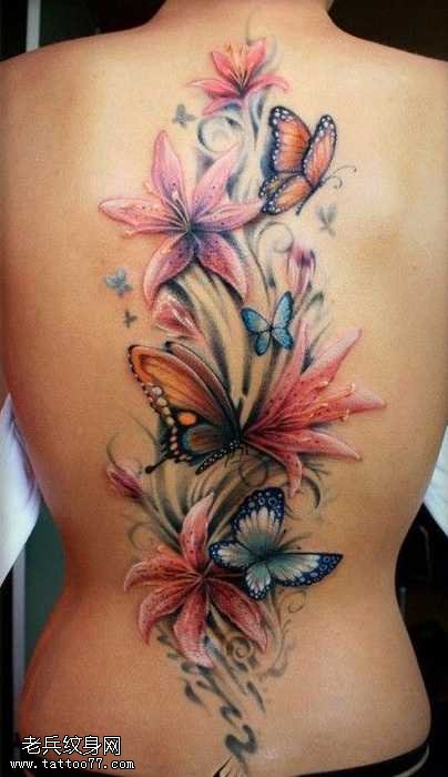 背部漂亮的彼岸花蝴蝶纹身图案