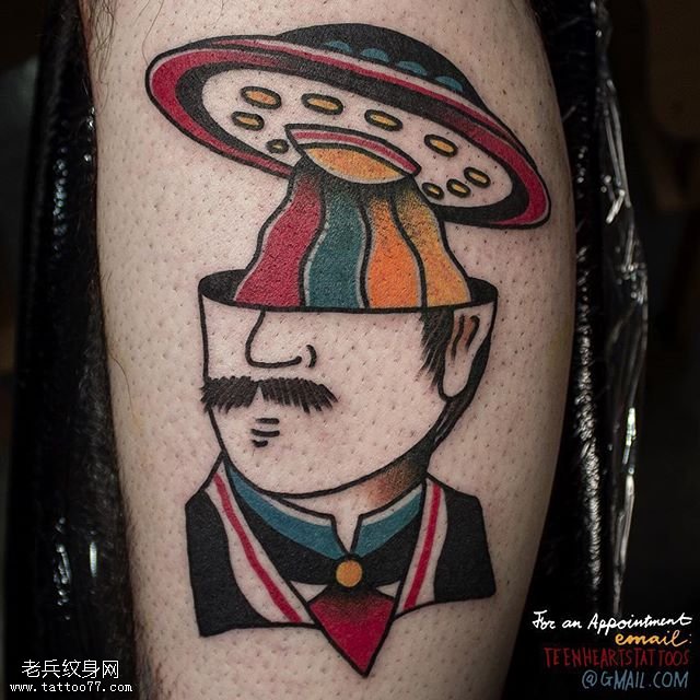 小腿抽象的人头像纹身图案