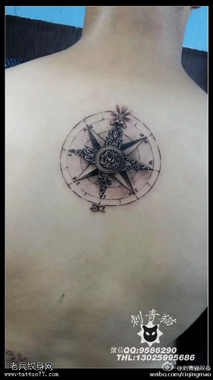 背部的指南针纹身图案