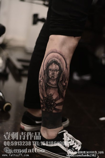 小腿上的圣女纹身图案