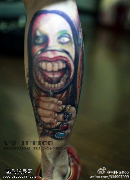 彩色放大镜下脸纹身图案