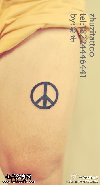 腿部点刺反战标志纹身图案