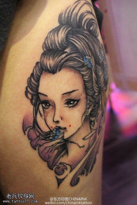 胳膊点刺美女蝴蝶纹身图案