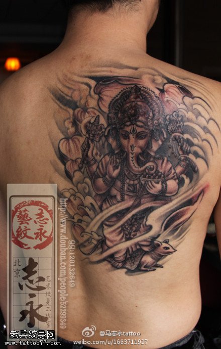 肩部手持金刚杵象神纹身图案