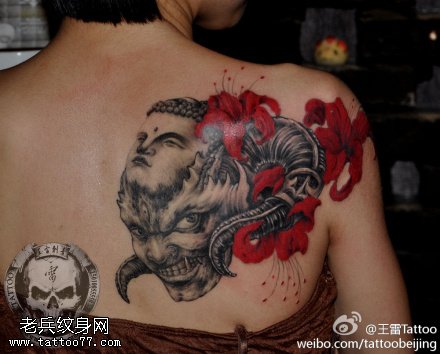 对比鲜明半佛半魔纹身图案