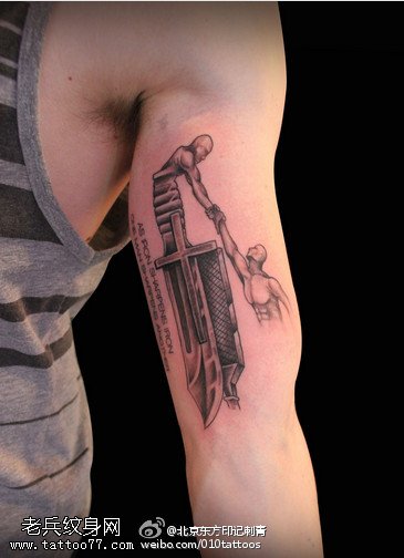 设计风格刀柄上的救世主纹身图案