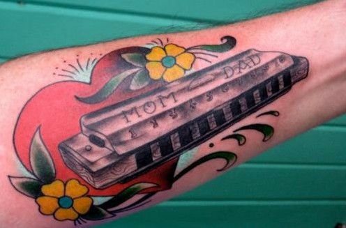 复古口琴刺青作品图片