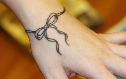 创意时尚蝴蝶结纹身图片