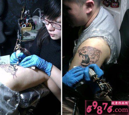 男人手臂凶猛虎头纹身现场图片