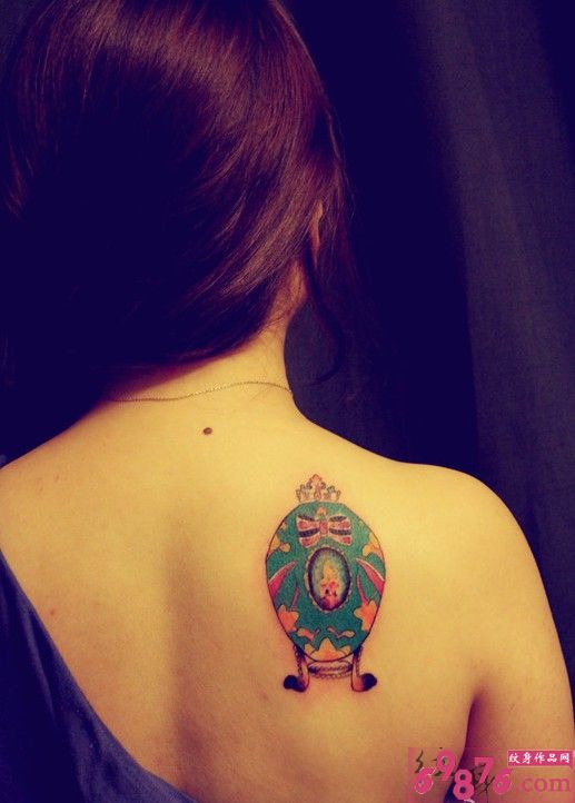 创意小图案后肩纹身图片