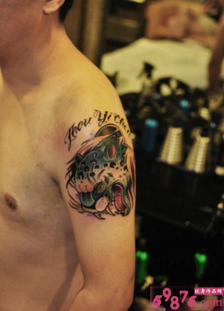 彩色豹子头像霸气手臂纹身图片