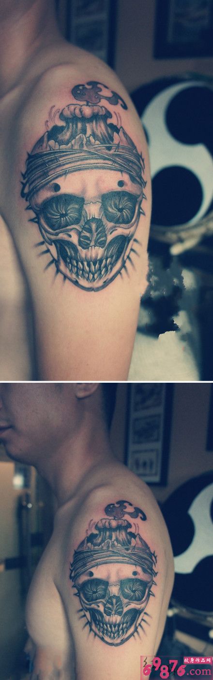 个性蜡烛骷髅手臂纹身图片