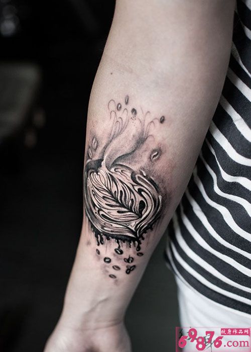 另类艺术风手臂时尚纹身图片