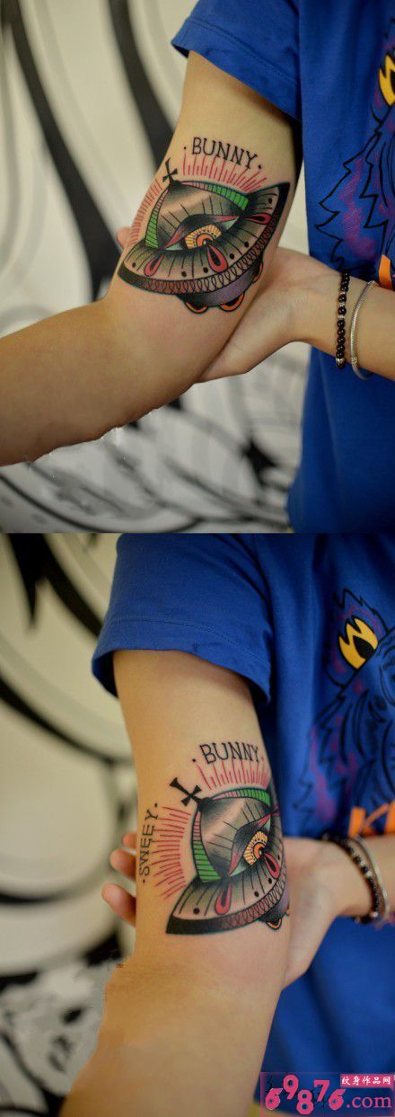 创意彩色飞碟手臂纹身图片
