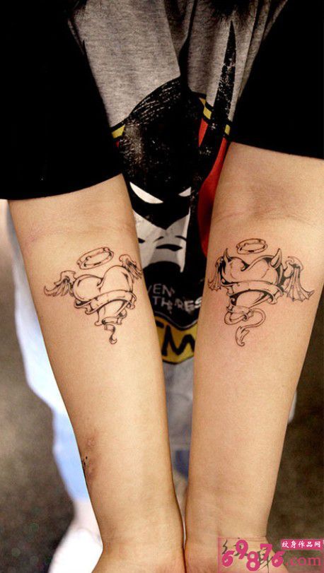 天使恶魔心手臂纹身图片