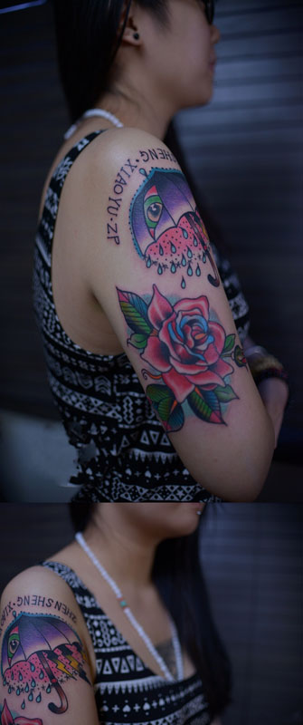 雨伞玫瑰花臂刺青图片