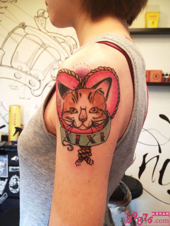 可爱卡通猫咪手臂纹身图片