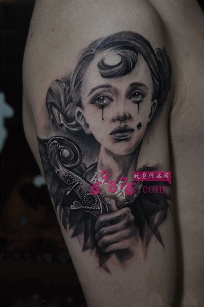 流泪的精灵女孩手臂纹身图片