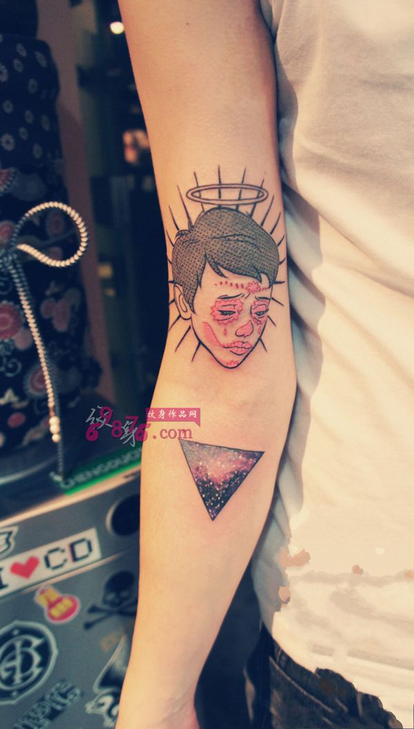 另类艺术头像手臂纹身图片