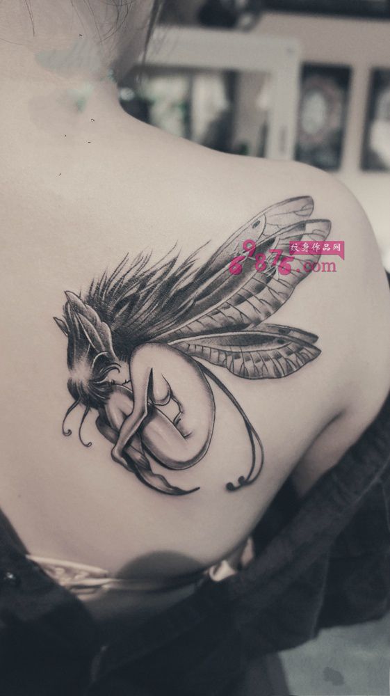 香肩沉睡小精灵时尚纹身图片