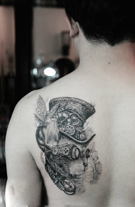 个性蒸汽朋克喵星人肩部纹身图片