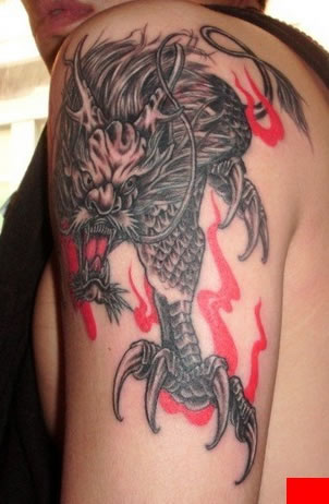 臂膀上的黑色神兽麒麟纹身图案图片