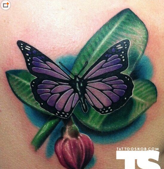 肩部一款个性缘叶蝴蝶纹身图案图片