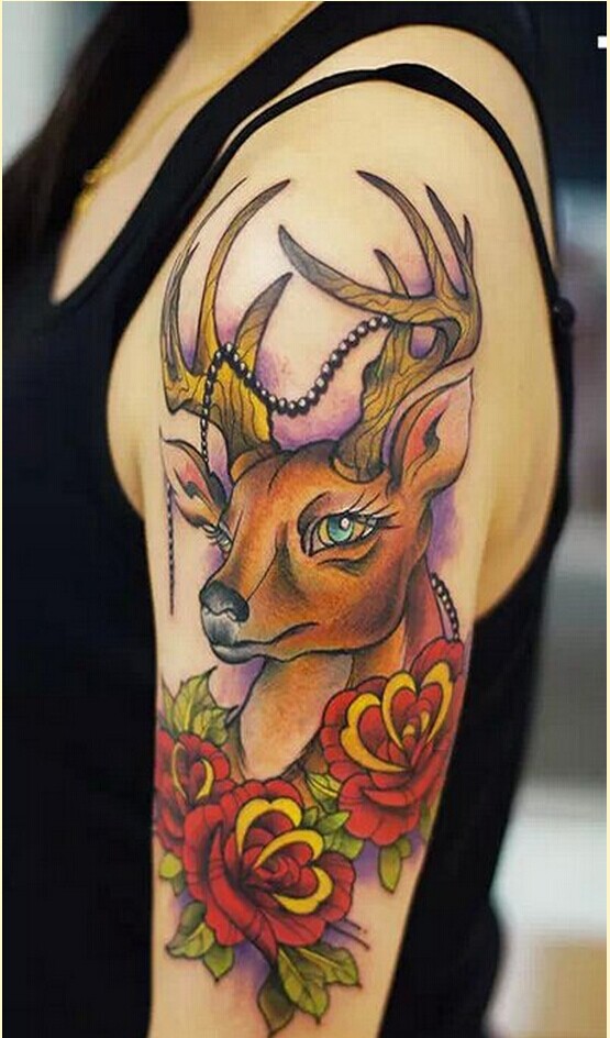 女性手臂漂亮鹿与玫瑰纹身图案图片