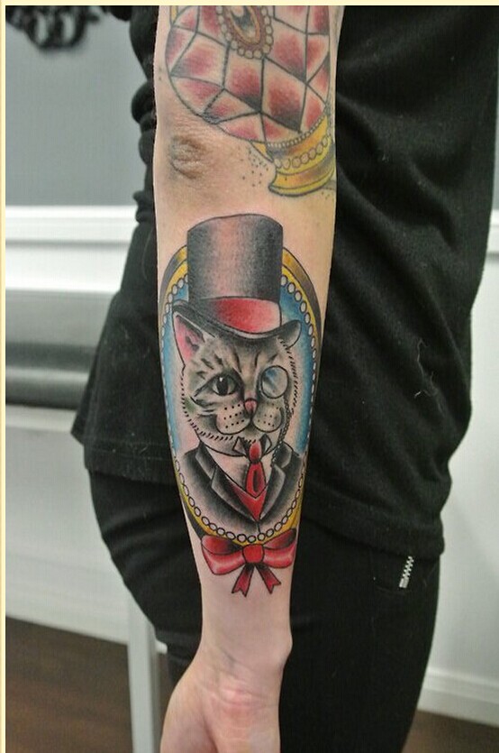 时尚手臂漂亮猫咪蝴蝶结纹身图案图片