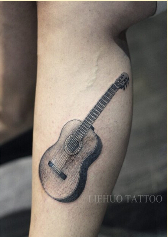 个性时尚手臂漂亮吉他纹身图案欣赏图片