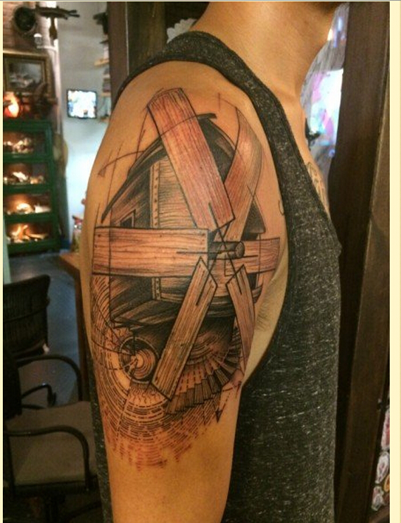 个性手臂时尚好看的风车纹身图案图片