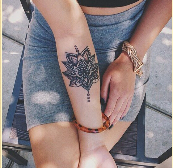 时尚女性手臂好看梵花纹身图案图片