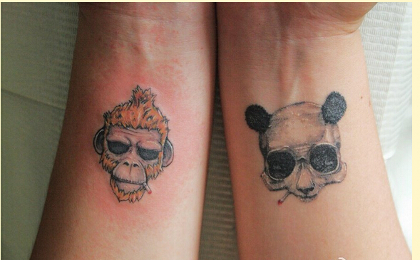 个性手腕漂亮的卡通熊猫猴子纹身图案图片