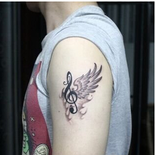 时尚男生手臂翅膀与音符纹身图案  图片