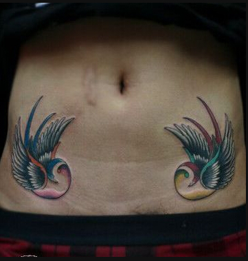 女生腹部唯美好看的小燕子纹身图案  图片