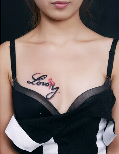 性感美女胸部精美漂亮的蝴蝶结文字纹图片