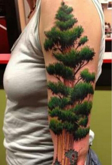 个性美女手臂上3D纹身的松树纹身图案图片