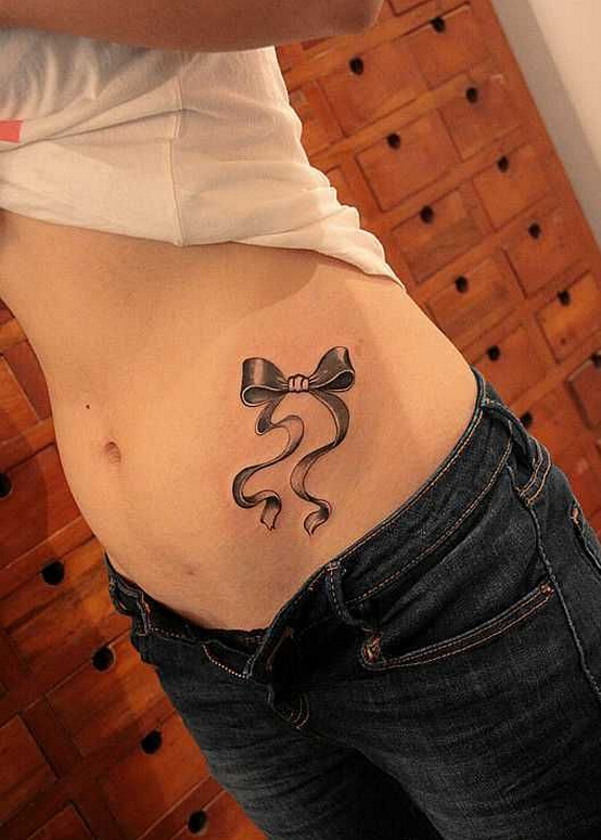 美女腰部性感优雅漂亮的蝴蝶结纹身图图片